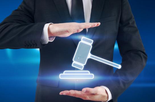 Online,Auction,Bidding,Concept,With,Man,In,Black,Suit,Carries