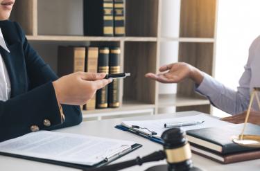 Lawyer,Is,Giving,Advice,To,Clients,Who,Have,Consulted,About